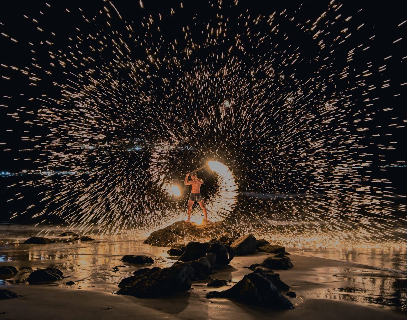 Fire show on a Phuket beach at night